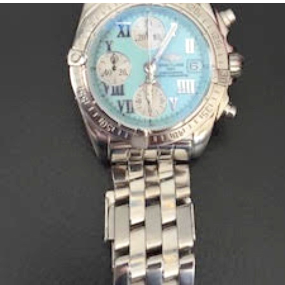 For sale is a striking and elegant Breitling Cockpit Chronograph A13358